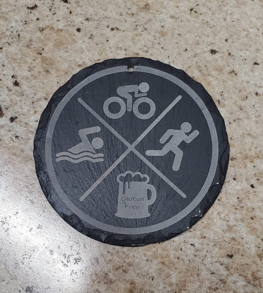 Slate ornament with triathlon logo